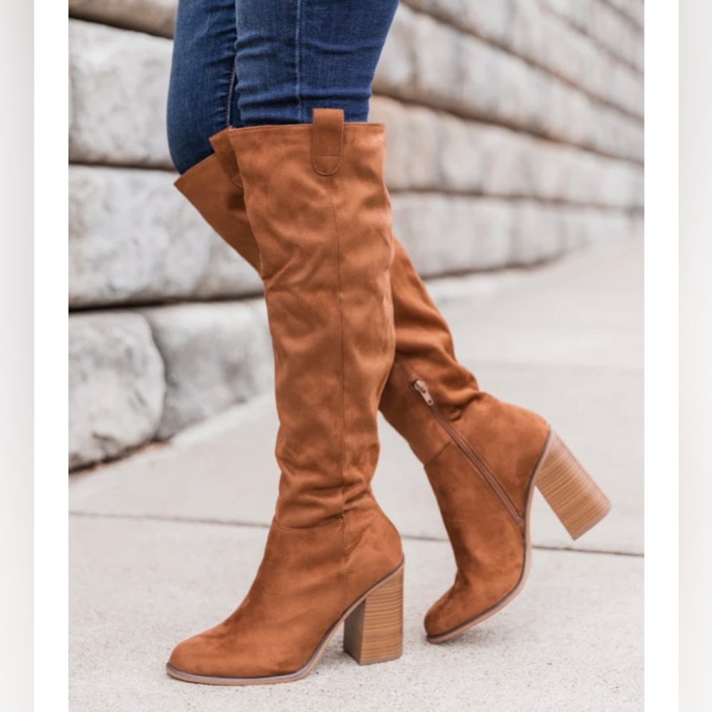 Tall brown heeled boots
